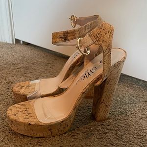 High heels/ Cork material with clear strap. NEVER WORN.
